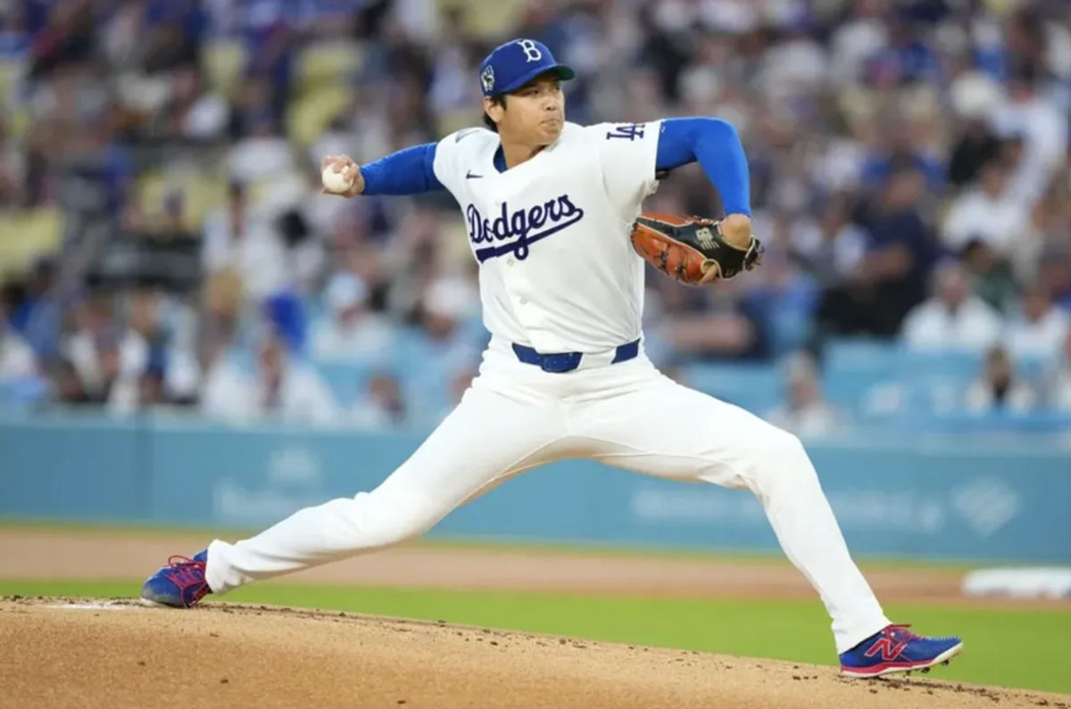 15 de abril de 2026; Los Ángeles, California, EE. UU.; Shohei Ohtani, jugador polivalente de los Dodgers de Los Ángeles, lanza contra los Mets de Nueva York en la primera entrada en el Dodger Stadium. Crédito obligatorio: Kirby Lee-Imagn Images