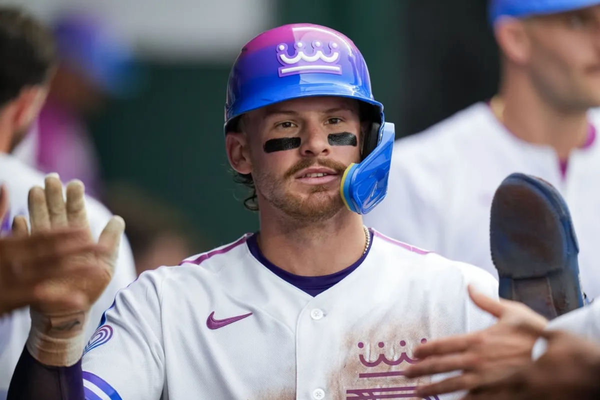 Apr 25, 2026; Kansas City, Missouri, USA; Kansas City Royals shortstop Bobby Witt Jr. (7) is congratulated by teammates after scoring a run during the third inning against the Los Angeles Angels at Kauffman Stadium. Mandatory Credit: Jay Biggerstaff-Imagn Images