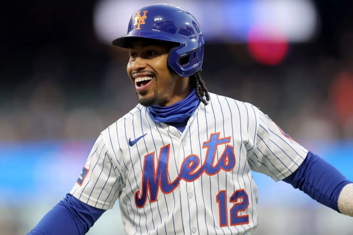 Apr 22, 2026; New York City, New York, USA; New York Mets shortstop Francisco Lindor (12) reacts after his RBI infield single against the Minnesota Twins during the first inning at Citi Field. Mandatory Credit: Brad Penner-Imagn Images