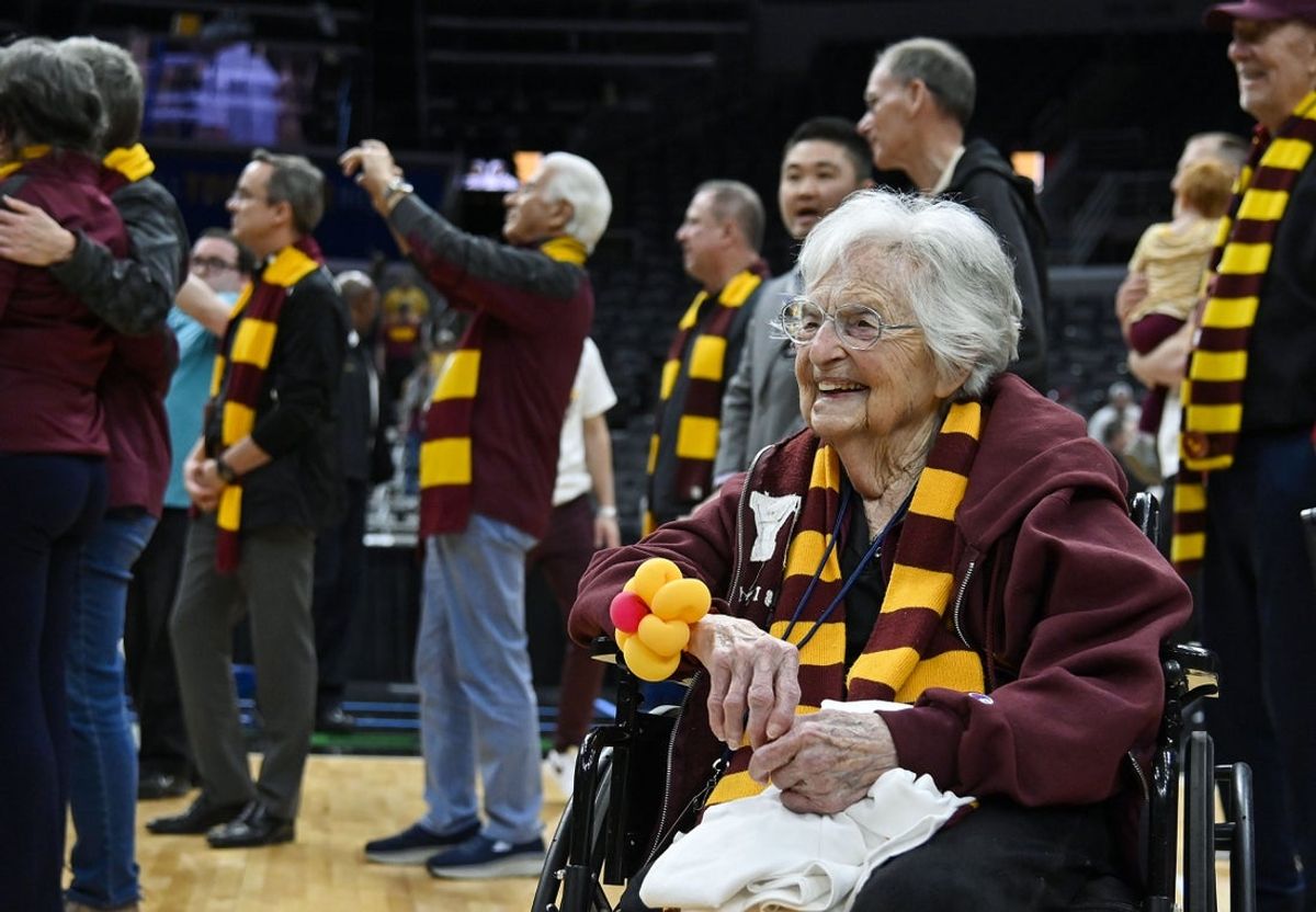 Mar 6, 2022; St. Louis, MO, USA;  Loyola Ramblers fan Sister Jean looks on as the Ramblers receive the Missouri Valley Trophy after defeating the Drake Bulldogs in the finals of the Missouri Valley Conference Tournament at Enterprise Center. Mandatory Credit: Jeff Curry-Imagn Images