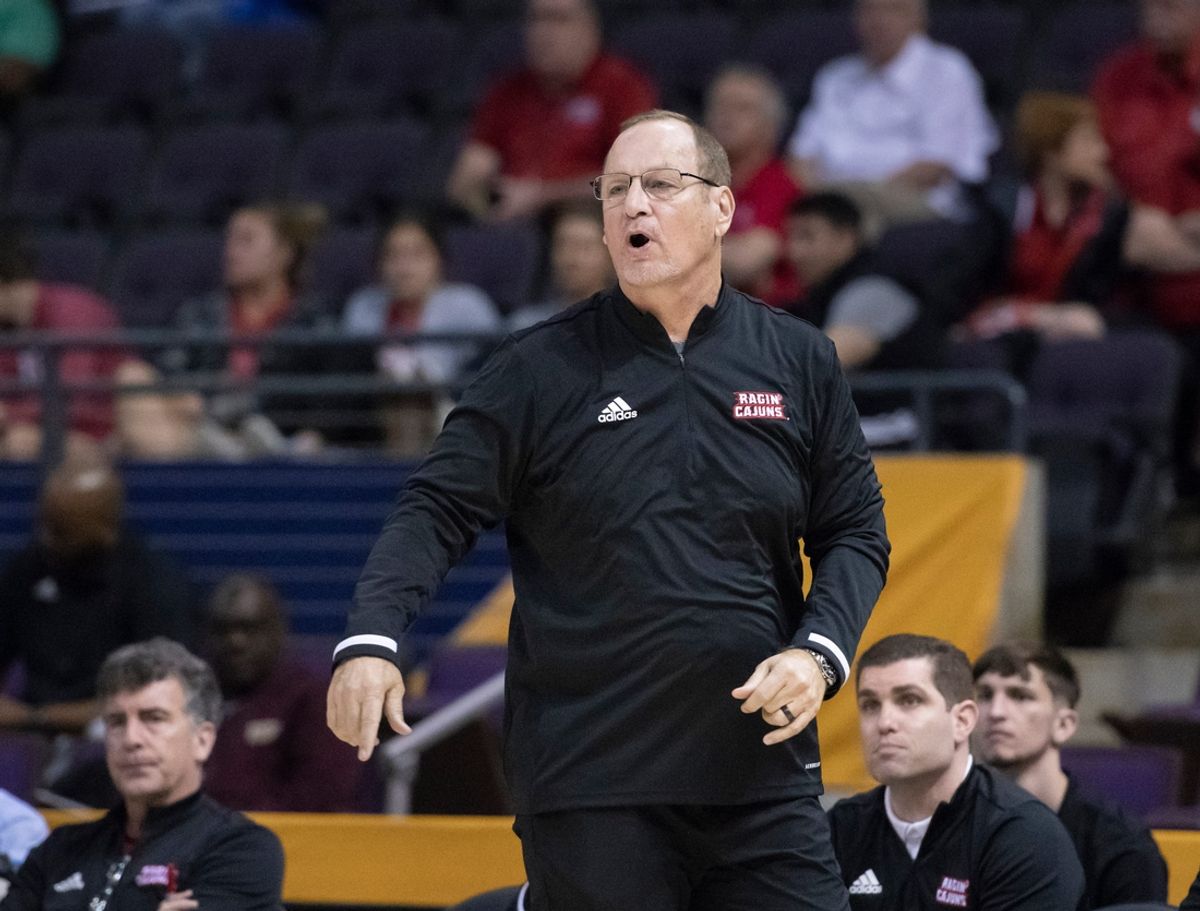 Ragin Cajuns head coach Bob Marlin yells instructions to his players during the University of Texas at Arlington vs. Louisiana men's basketball game in the first round of the Sun Belt Conference championship tournament at the Pensacola Bay Center in Pensacola on Thursday, March 3, 2022.

Syndication News Journal
