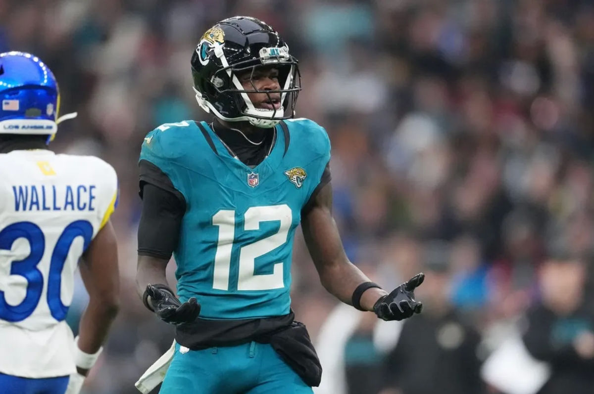 Oct 19, 2025; London, United Kingdom; Jacksonville Jaguars wide receiver Travis Hunter (12) reacts after a play against the Los Angeles Rams during the second half of an NFL International Series game at Wembley Stadium. Mandatory Credit: Kirby Lee-Imagn Images