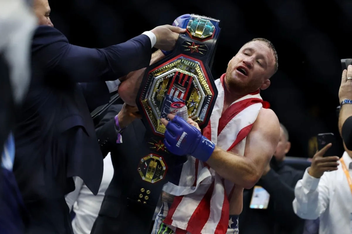 Jun 14, 2026; Washington, D.C., UNITED STATES; Justin Gaethje holds his championship belt after his win against Ilia Topuria (not pictured) during UFC Freedom 250 at White House South Lawn. Mandatory Credit: Amber Searls-Imagn Images