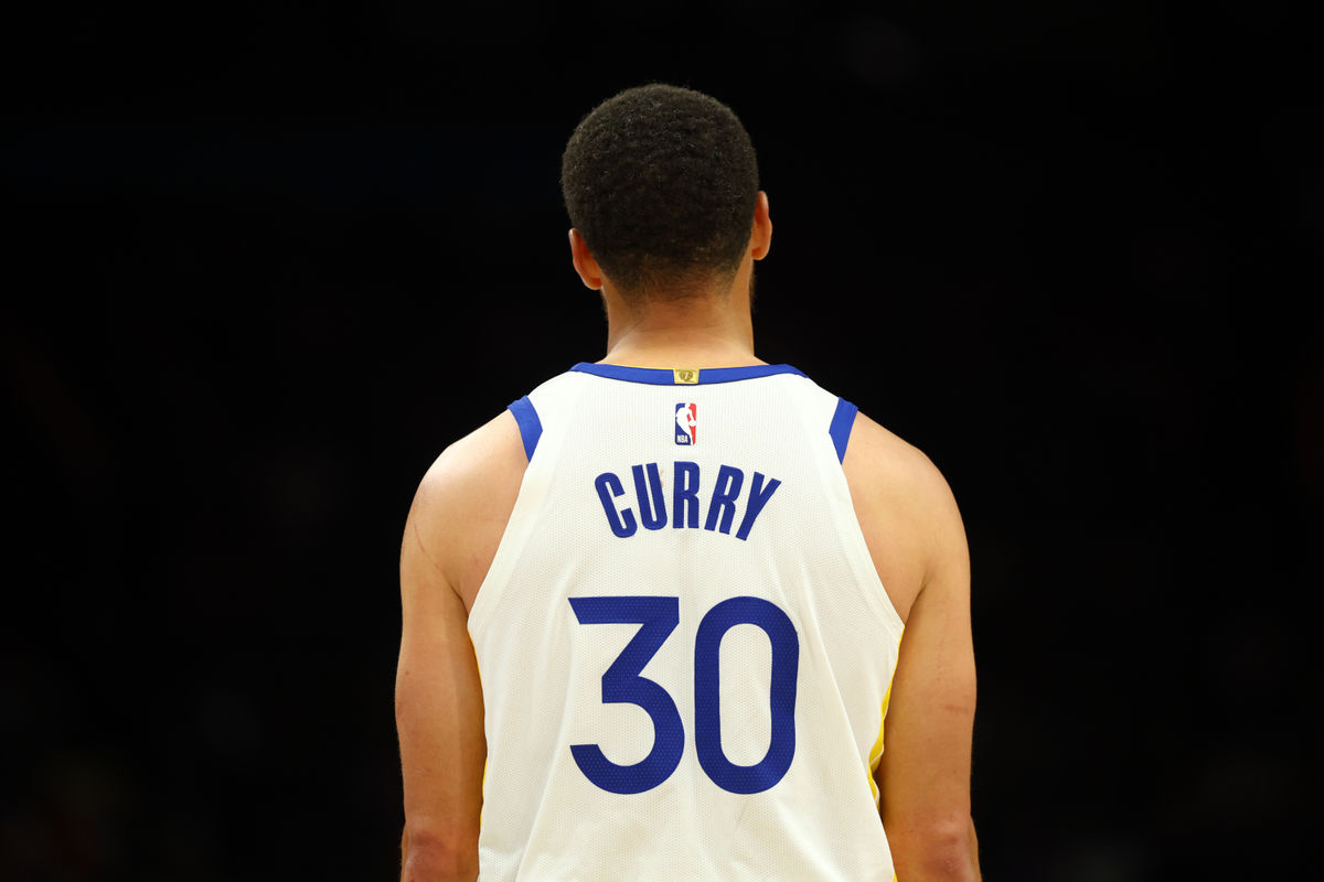 Apr 17, 2026; Phoenix, Arizona, USA; Detailed view of the jersey of Golden State Warriors guard Stephen Curry (30) against the Phoenix Suns during the play-in rounds of the 2026 NBA Playoffs at Mortgage Matchup Center. Mandatory Credit: Mark J. Rebilas-Imagn Images