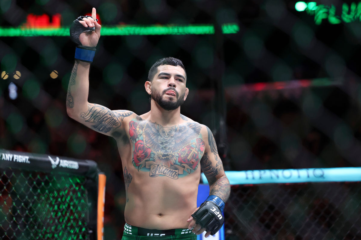Feb 21, 2026; Houston, Texas, USA; Sean Strickland (red gloves) fights Anthony Hernandez (blue gloves) in a middleweight bout during UFC Fight Night at Toyota Center. Mandatory Credit: Troy Taormina-Imagn Images