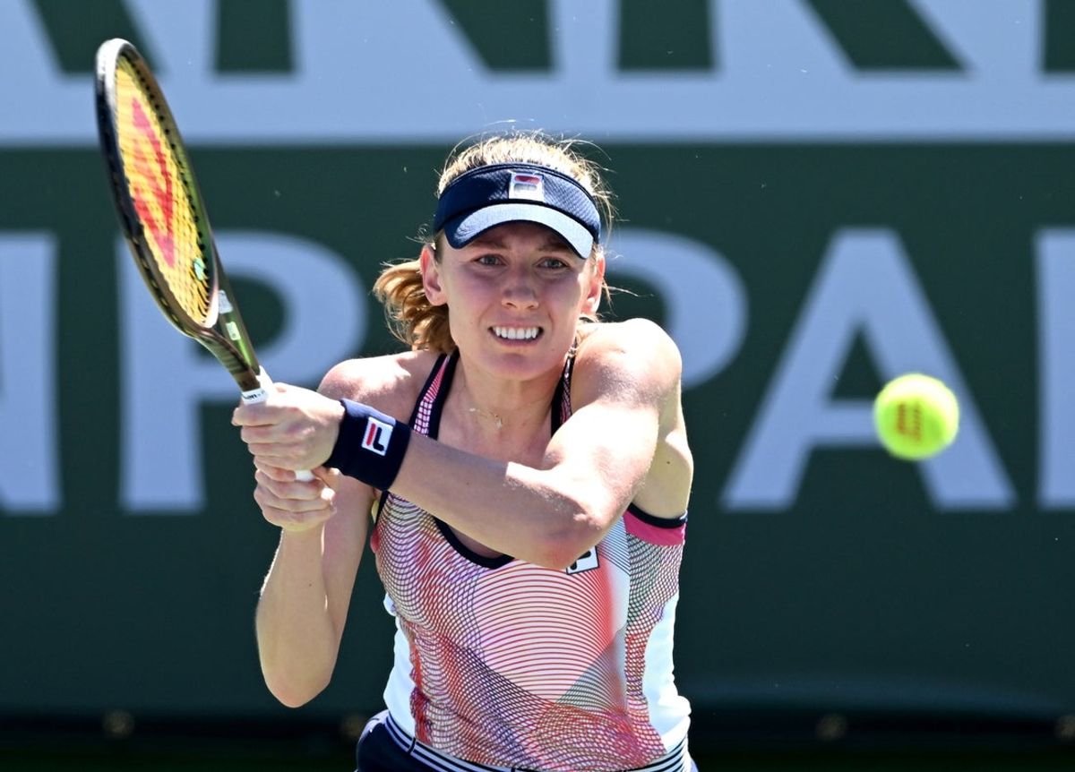 Mar 11, 2022; Indian Wells, CA, USA; Ekaterina Alexandrova (RUS) hits a shot in her 2nd round match against Simona Halep (ROU) at the BNP Paribas Open at the Indian Wells Tennis Garden. Mandatory Credit: Jayne Kamin-Oncea-Imagn Images