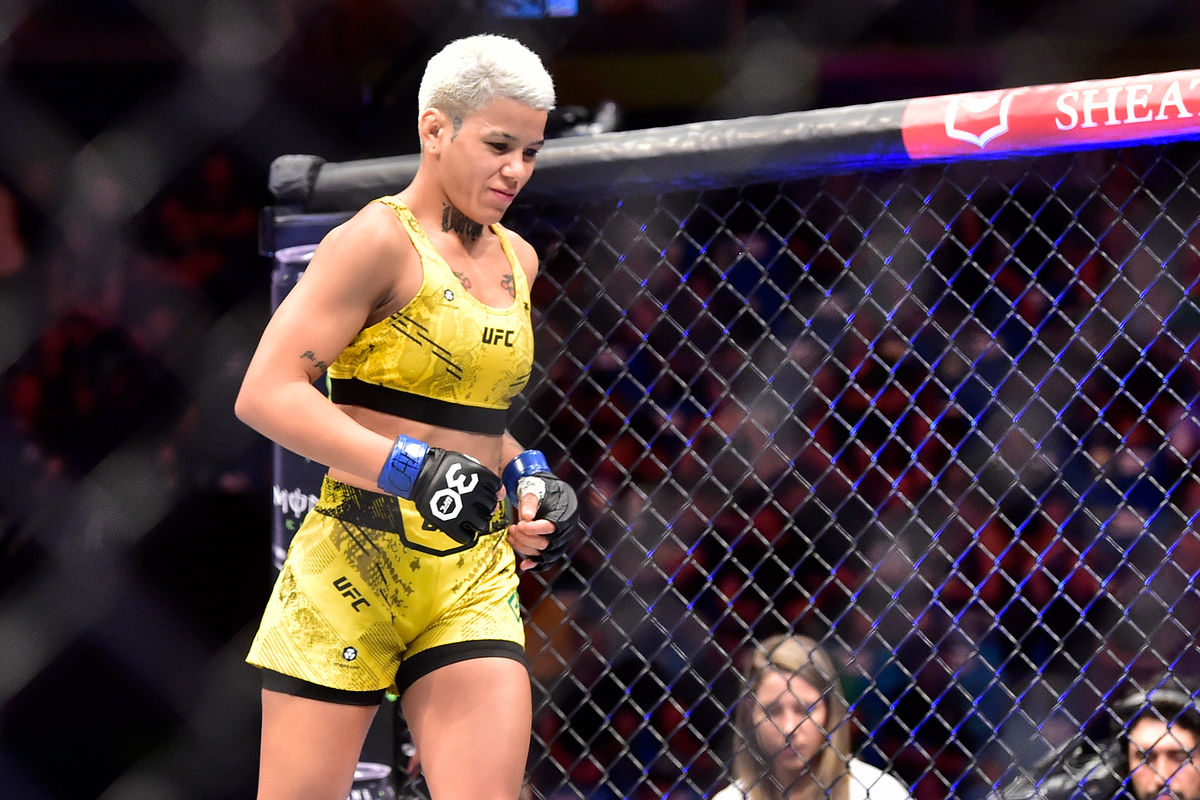 Nov 4, 2023; Sao Paulo, Brazil; Denise Gomes (blue gloves) prepares to fight Angela Hill (not pictured) during UFC Fight Night at Ibirapuera Arena. Mandatory Credit: Jason da Silva-USA TODAY Sports