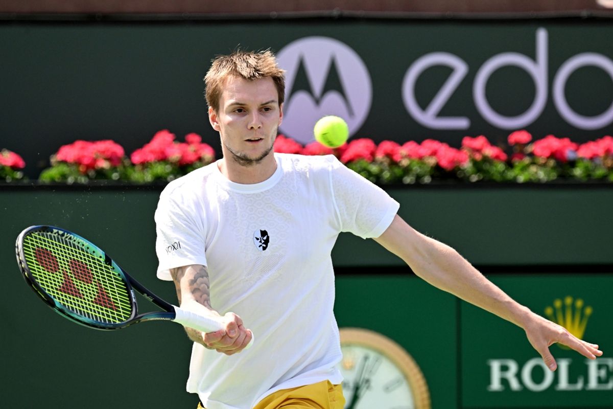Mar 13, 2022; Indian Wells, CA, USA;  Alexander Bublik (KAZ) hits a shot against Andy Murray (GBR) during a second round match at the BNP Paribas Open at the Indian Wells Tennis Garden. Mandatory Credit: Jayne Kamin-Oncea-Imagn Images