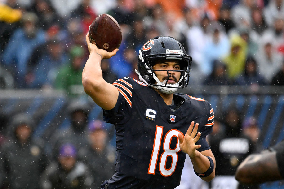Sep 20, 2026; Chicago, Illinois, USA; Chicago Bears quarterback Caleb Williams (18) throws a pass against the Minnesota Vikings during the first quarter at Soldier Field. Mandatory Credit: Matt Marton-Imagn Images