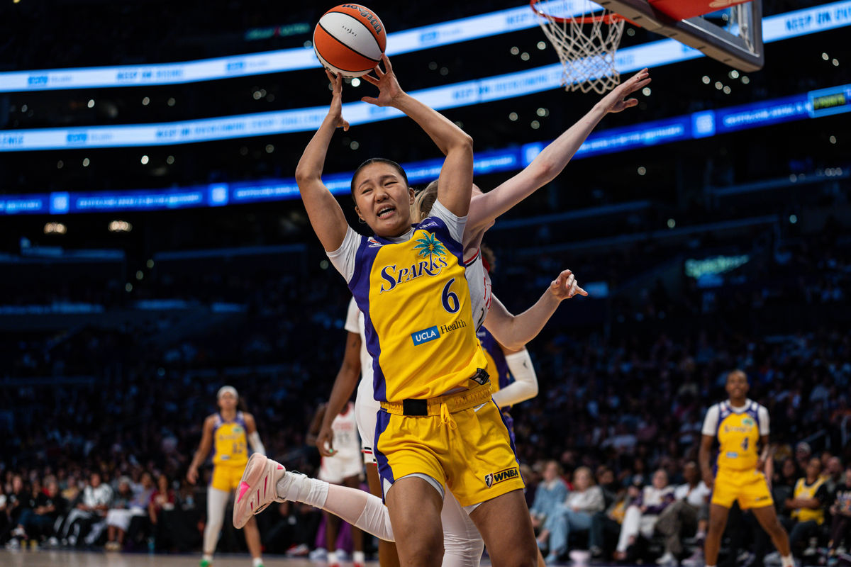 Sep 20, 2026; Los Angeles, California, USA; Los Angeles Sparks forward Jihyun Park (6) fights for a rebound in the fourth quarter against the Portland Fire at Crypto.com Arena. Mandatory Credit: Jon Endow-Imagn Images