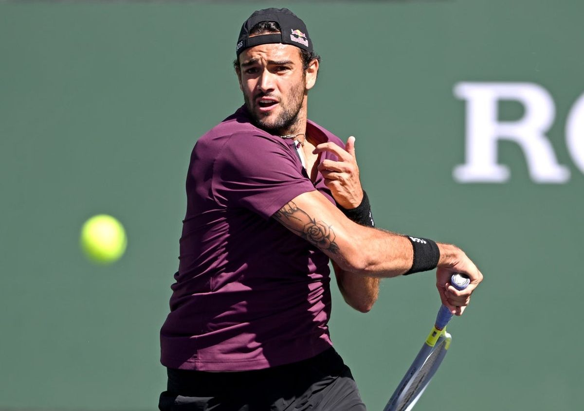 Mar 16, 2022; Indian Wells, CA, USA; Matteo Berrettini (ITA) hits a shot during his fourth round match against Miomir Kecmanovic (not pictured) at the BNP Paribas Open at the Indian Wells Tennis Garden. Mandatory Credit: Jayne Kamin-Oncea-Imagn Images