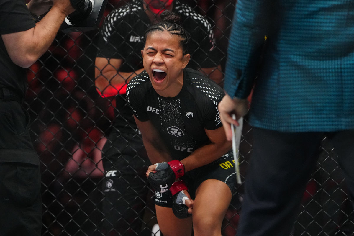 Jan 24, 2026; Las Vegas, Nevada, USA; Natalia Silva (red gloves) reacts before the fight against Rose Namajunas (blue gloves) during UFC 324 at T-Mobile Arena. Mandatory Credit: Stephen R. Sylvanie-Imagn Images