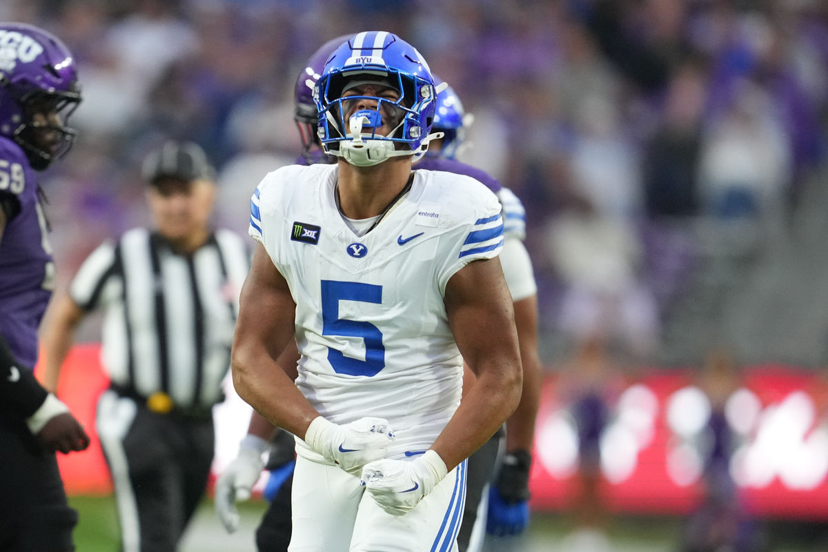 Oct 3, 2026; Fort Worth, Texas, USA; BYU Cougars defensive end Nusi Taumoepeau (5) reacts after a sack against the TCU Horned Frogs during the first half at Amon G. Carter Stadium. Mandatory Credit: Chris Jones-Imagn Images