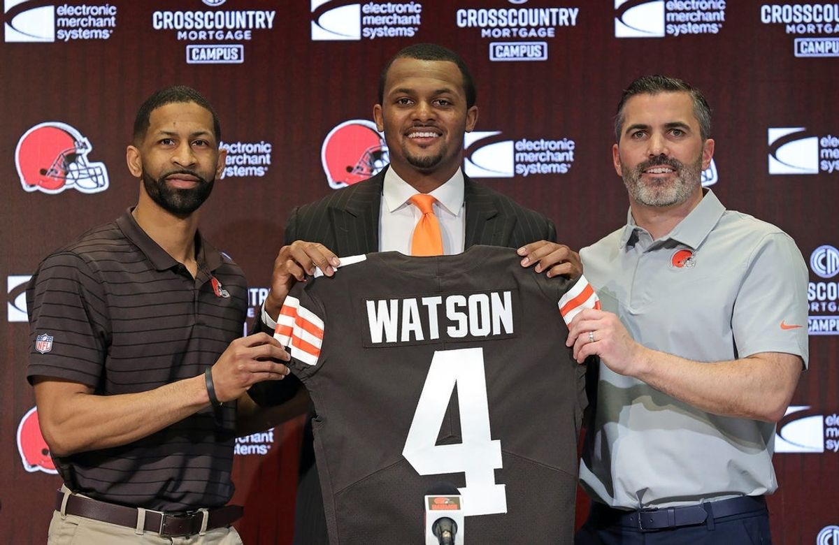 Cleveland Browns quarterback Deshaun Watson, center, poses for a portrait with general manager Andrew Berry, left, and head coach Kevin Stefanski during Watson's introductory press conference at the Cleveland Browns Training Facility on Friday.

Watsonpress 11
