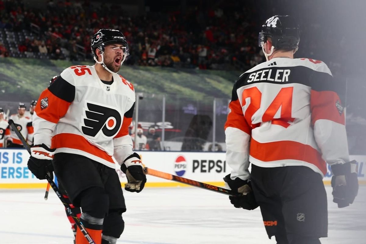 Feb 17, 2024; East Rutherford, New Jersey, USA; Philadelphia Flyers defenseman Nick Seeler (24) celebrates his goal against the Philadelphia Flyers during the third period in a Stadium Series ice hockey game at MetLife Stadium.