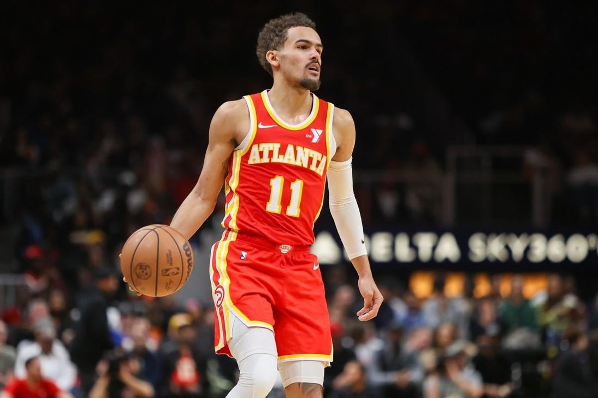 Feb 2, 2024; Atlanta, Georgia, USA; Atlanta Hawks guard Trae Young (11) dribbles against the Phoenix Suns in the second half at State Farm Arena.