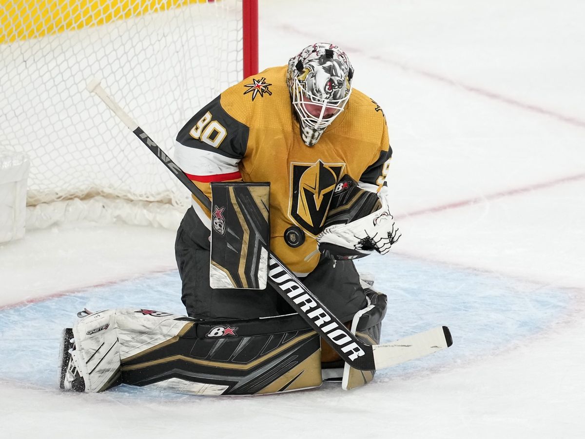 Apr 20, 2022; Las Vegas, Nevada, USA; Vegas Golden Knights goaltender Robin Lehner (90) makes a save against the Washington Capitals during the first period at T-Mobile Arena. Mandatory Credit: Stephen R. Sylvanie-Imagn Images