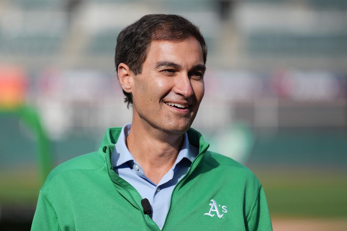 May 16, 2022; Oakland, California, USA; Oakland Athletics president Dave Kaval talks on the field before the game against the Minnesota Twins at RingCentral Coliseum. Mandatory Credit: Darren Yamashita-Imagn Images