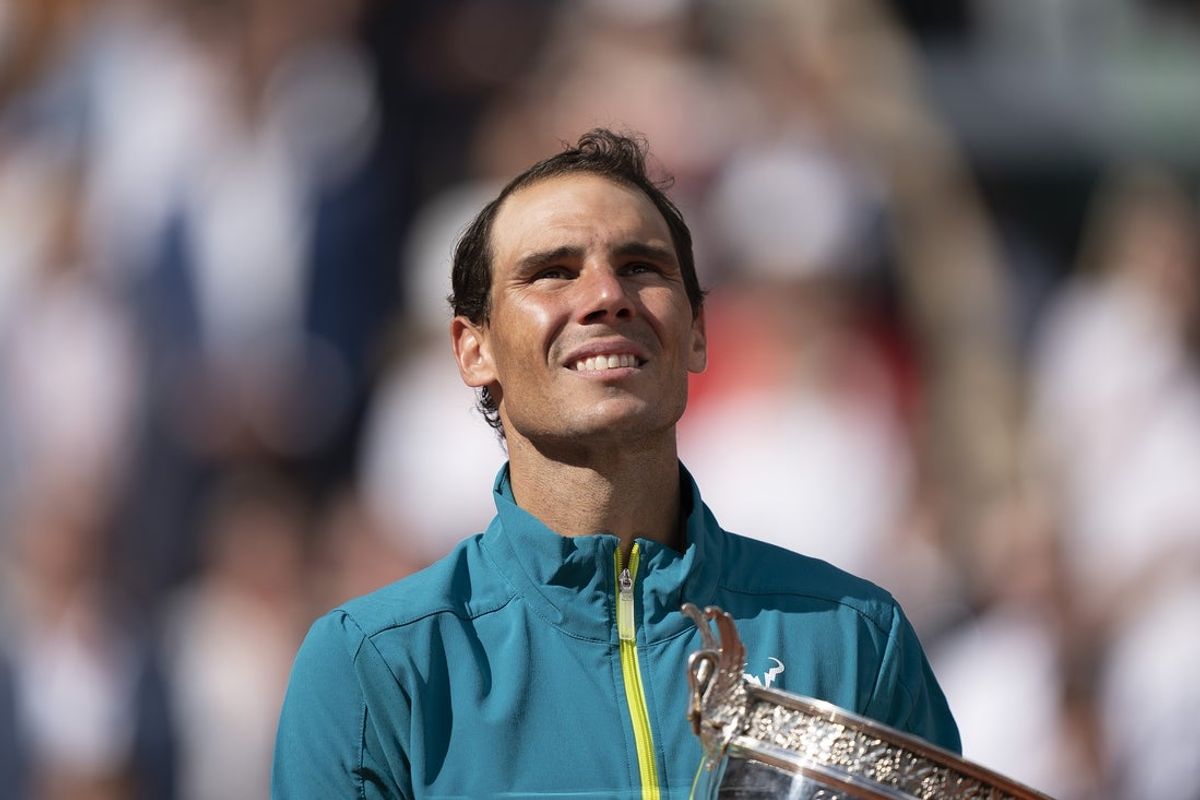 June 5, 2022; Paris, France; Rafael Nadal (ESP) poses with the trophy after winning  the men s singles final against Casper Ruud (NOR) on day 15 of the French Open at Stade Roland-Garros. Mandatory Credit: Susan Mullane-Imagn Images