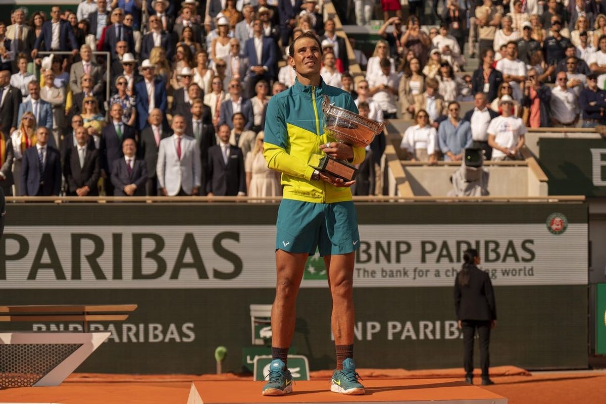 June 5, 2022; Paris, France; Rafael Nadal (ESP) poses with the trophy after winning  the men s singles final against Casper Ruud (NOR) on day 15 of the French Open at Stade Roland-Garros. Mandatory Credit: Susan Mullane-USA TODAY Sports