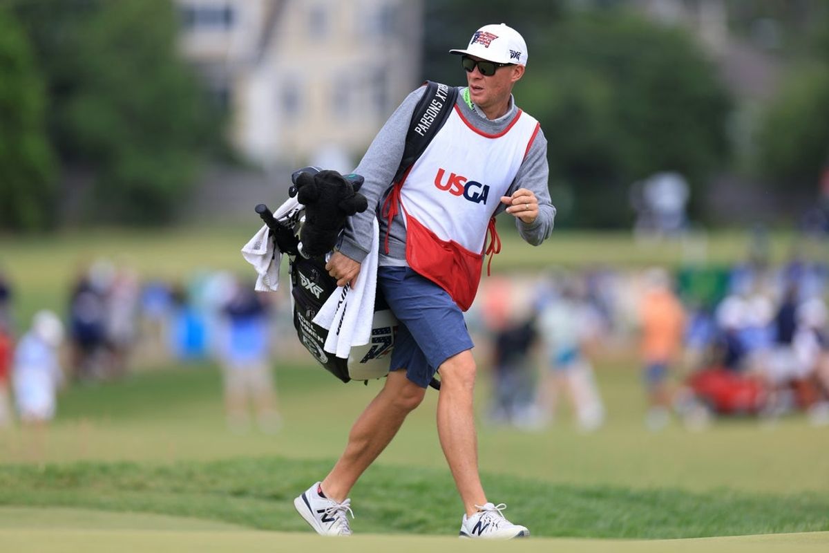 Jun 18, 2022; Brookline, Massachusetts, USA; Caddie Geno Bonnalie looks on during the third round of the U.S. Open golf tournament. Mandatory Credit: Aaron Doster-Imagn Images