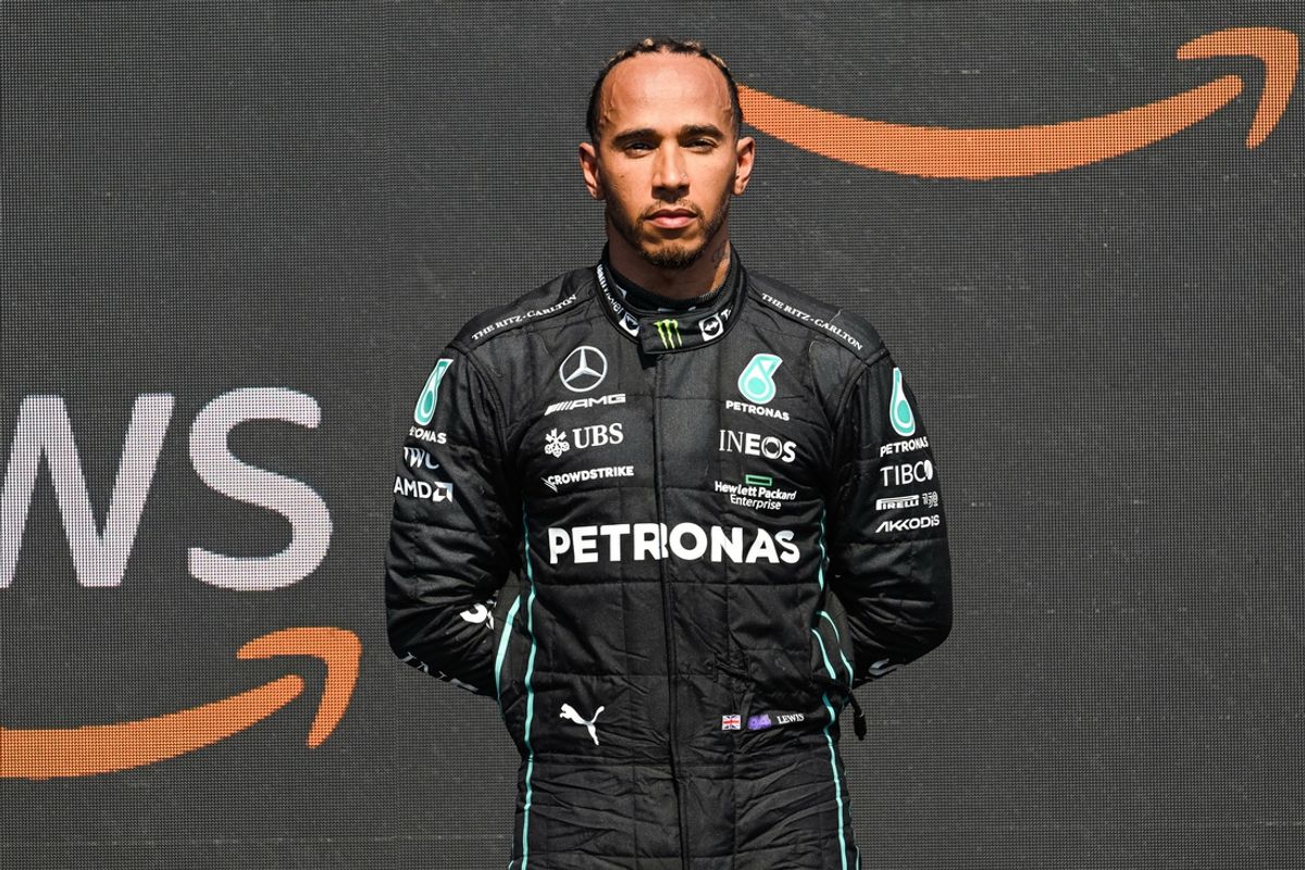 Jun 19, 2022; Montreal, Quebec, CAN; Mercedes driver Lewis Hamilton of United Kingdom stands during the national anthems after finishing third of the Montreal Grand Prix at Circuit Gilles Villeneuve. Mandatory Credit: David Kirouac-Imagn Images