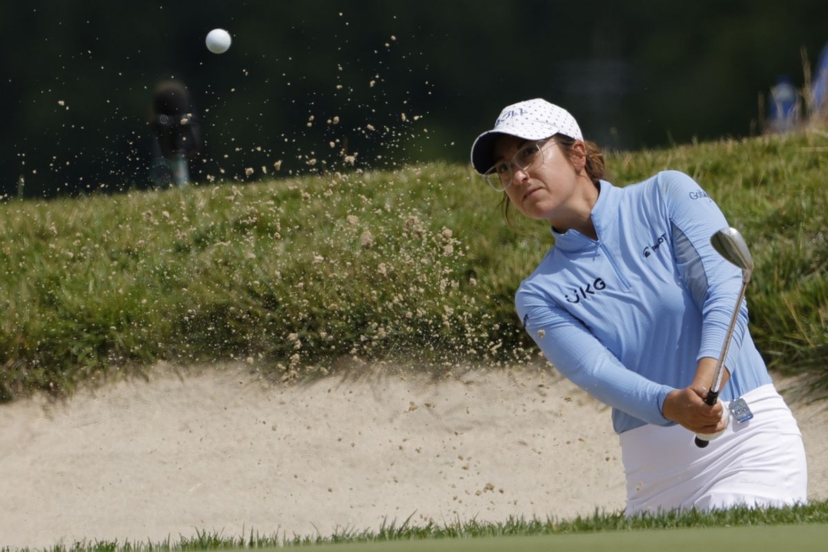 Jun 24, 2022; Bethesda, Maryland, USA; Marina Alex hits out of a green side bunker on the ninth hole during the second round of the KPMG Women's PGA Championship golf tournament. Mandatory Credit: Geoff Burke-Imagn Images