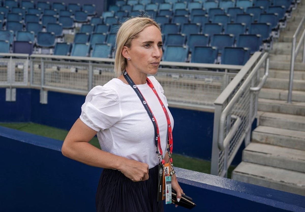 Jun 18, 2022; Kansas City, Kansas, USA; Kansas City general manager Camille Levin Ashton enters the field against the Chicago Red Stars prior to the match at Children's Mercy Park. Mandatory Credit: Denny Medley-USA TODAY Sports