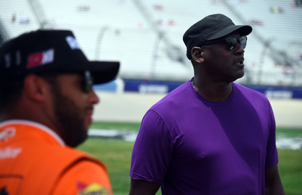 Jun 25, 2022; Nashville, Tennessee, USA; NASCAR Cup Series 23XI Racing owner Michael Jordan and driver Bubba Wallace (23) on pit road during qualifying for the Ally 400 at Nashville Superspeedway. Mandatory Credit: Christopher Hanewinckel-Imagn Images