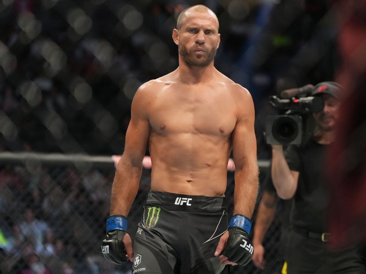 Jul 2, 2022; Las Vegas, Nevada, USA; Donald Cerrone (blue gloves) reacts before a bout against Jim Miller (red gloves) during UFC 276 at T-Mobile Arena. Mandatory Credit: Stephen R. Sylvanie-Imagn Images