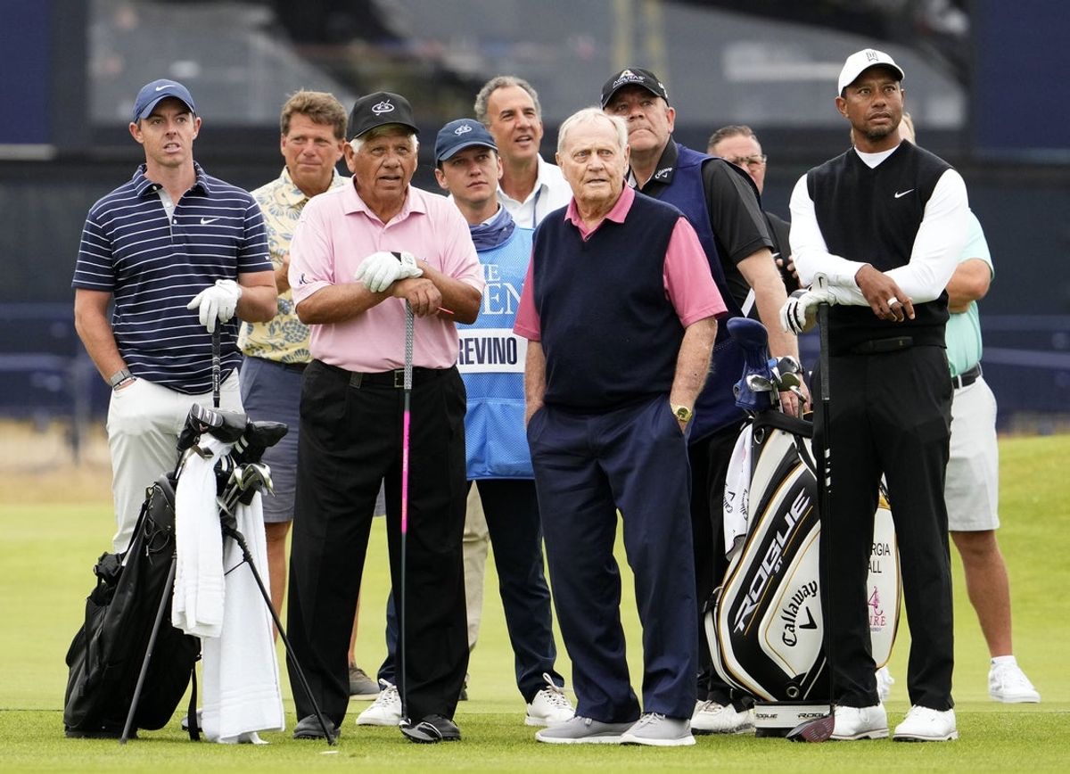 Jul 11, 2022; St. Andrews, SCT; Rory McIlroy, Lee Trevino, Jack Nicklaus, and Tiger Woods during the R&A Celebration of Champions four-hole challenge at the 150th Open Championship golf tournament at St. Andrews Old Course. Mandatory Credit: Rob Schumacher-Imagn Images
