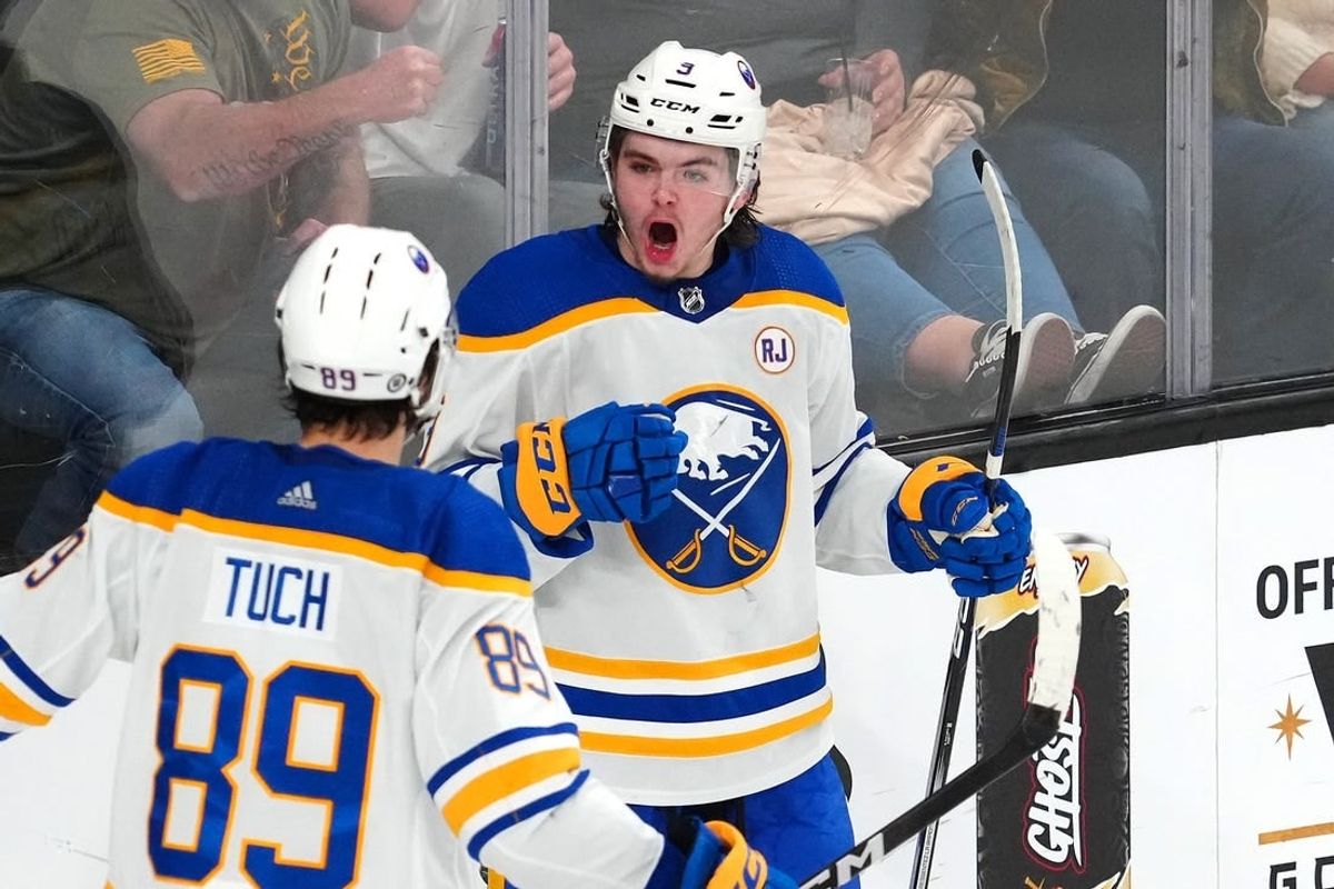 Dec 15, 2023; Las Vegas, Nevada, USA; Buffalo Sabres left wing Zach Benson (9) celebrates with Buffalo Sabres right wing Alex Tuch (89) after scoring a goal against the Vegas Golden Knights during the third period at T-Mobile Arena.