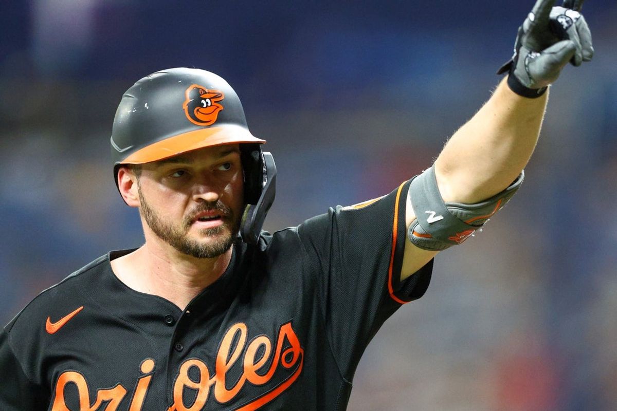 Jul 15, 2022; St. Petersburg, Florida, USA;  Baltimore Orioles designated hitter Trey Mancini (16) reacts after hitting a home run against the Tampa Bay Rays in the third inning at Tropicana Field. Mandatory Credit: Nathan Ray Seebeck-Imagn Images