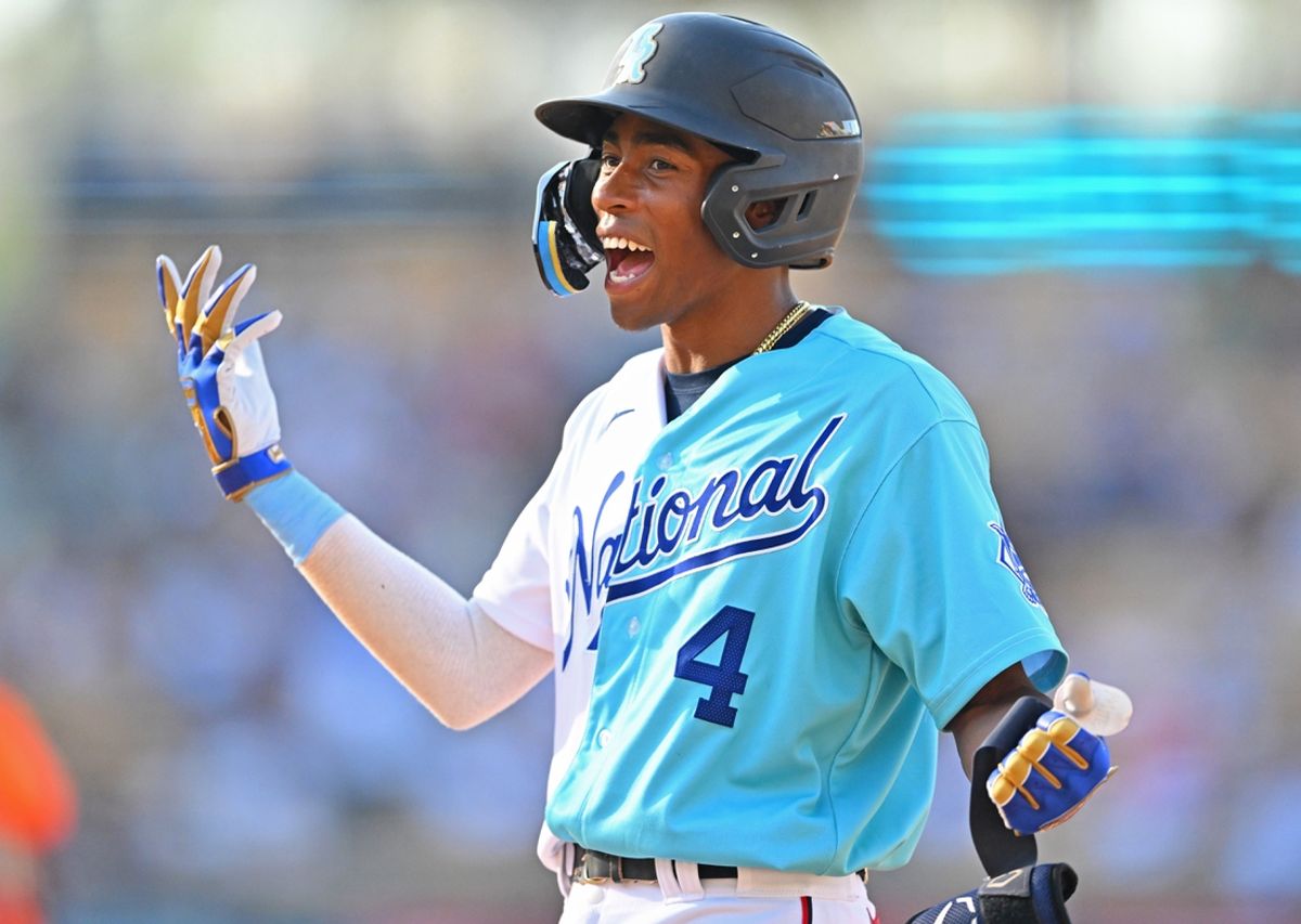 Jul 16, 2022; Los Angeles, CA, USA; National League Futures infielder Darren Baker (4) reacts after American League Futures relief pitcher Yosver Zulueta (not pictured) makes a diving catch on batted ball by Baker for out in the sixth inning of the All Star-Futures Game at Dodger Stadium. Mandatory Credit: Jayne Kamin-Oncea-USA TODAY Sports