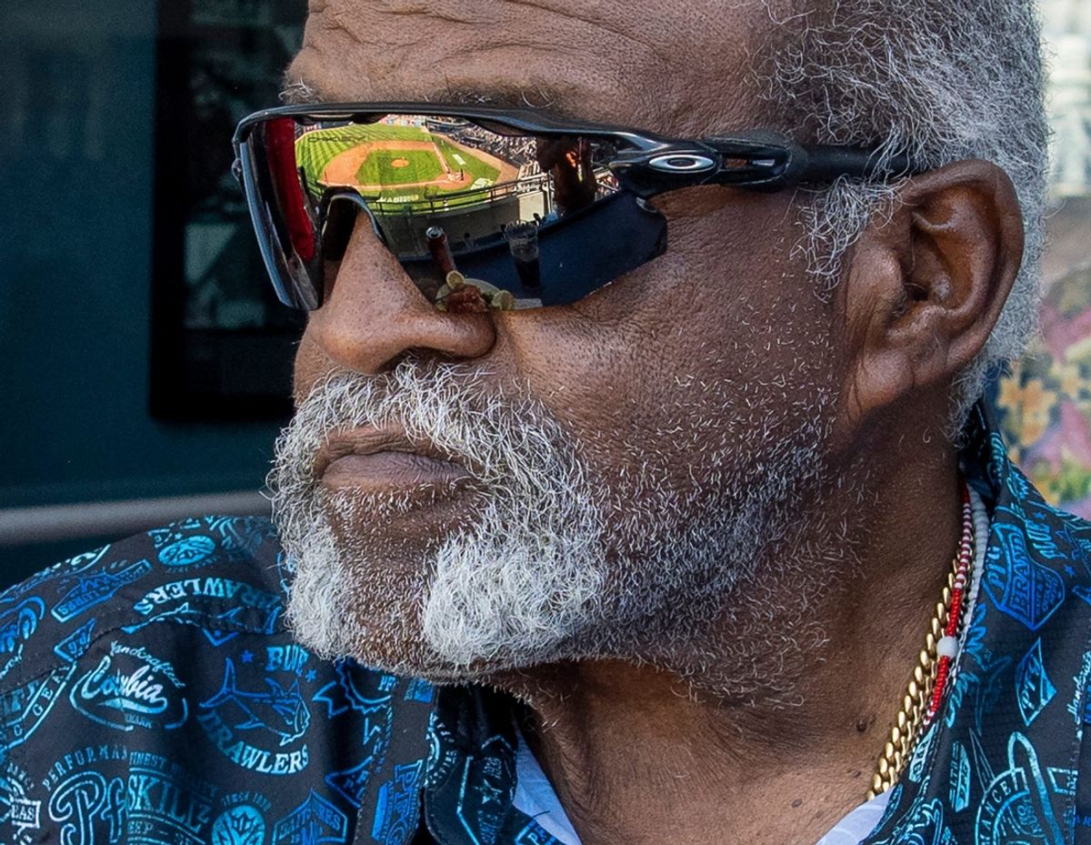 The baseball diamond is reflected in the sunglasses of Red Sox legend Luis Tiant as he watches a game in WooSox owner Larry Lucchino's suite Wednesday.

CP2