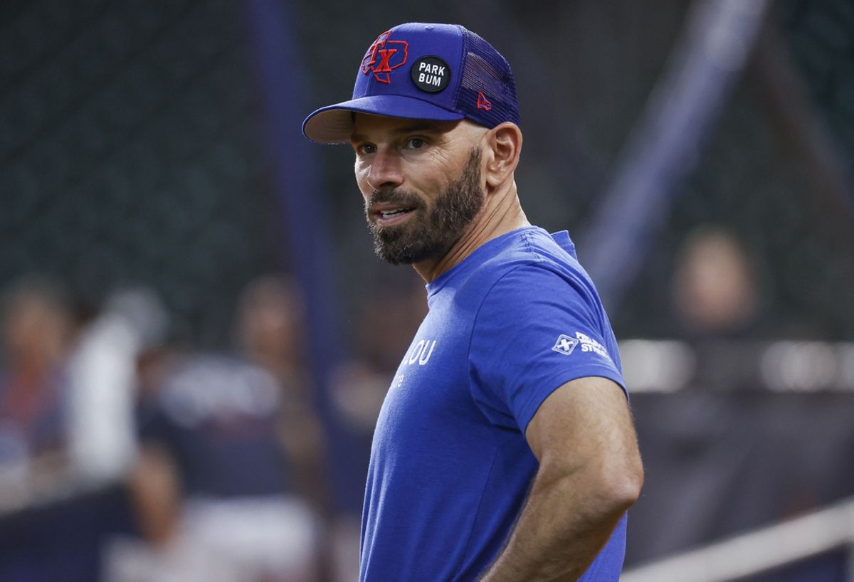 Aug 9, 2022; Houston, Texas, USA; Texas Rangers manager Chris Woodward (8) stands on the field before the game against the Houston Astros at Minute Maid Park. Mandatory Credit: Troy Taormina-Imagn Images