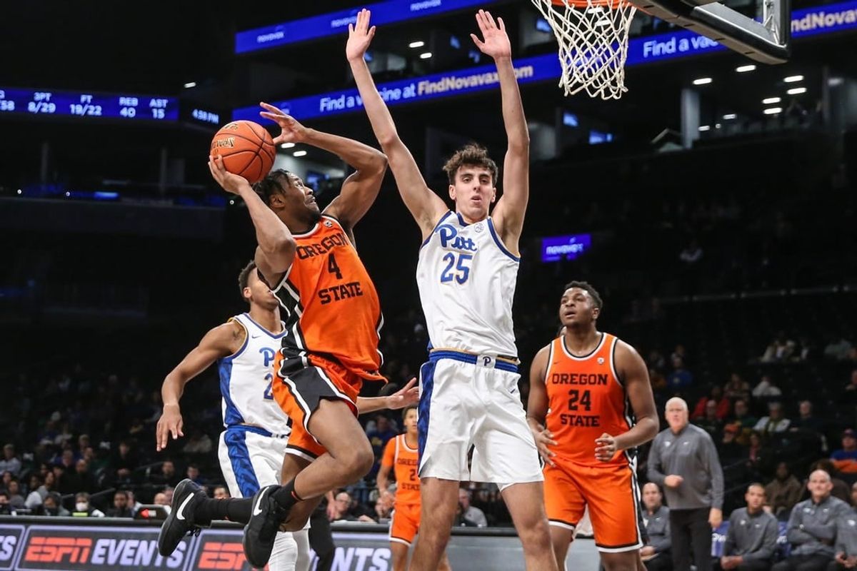 Nov 24, 2023; Brooklyn, NY, USA;  Oregon State Beavers guard Dexter Akanno (4) and Pittsburgh Panthers forward Guillermo Diaz Graham (25) at Barclay Center.