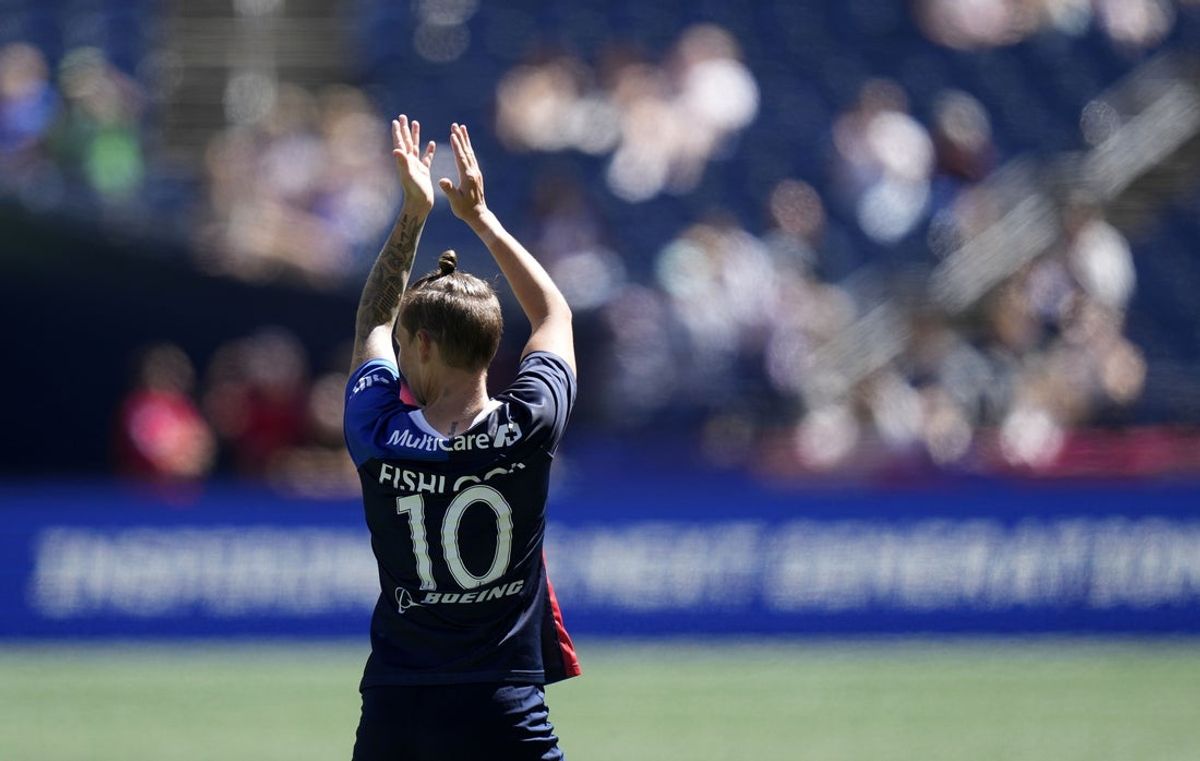 Aug 14, 2022; Seattle, Washington, USA; OL Reign midfielder Jess Fishlock (10) reacts during the second half against the NJ/NY Gotham FC at Lumen Field. Mandatory Credit: Stephen Brashear-Imagn Images