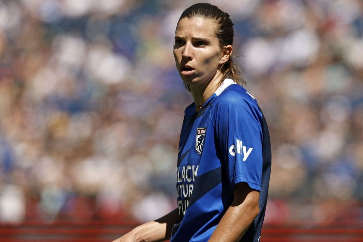 Aug 14, 2022; Seattle, Washington, USA; OL Reign forward Tobin Heath (77) against the NJ/NY Gotham FC during the second half at Lumen Field. Mandatory Credit: Joe Nicholson-Imagn Images
