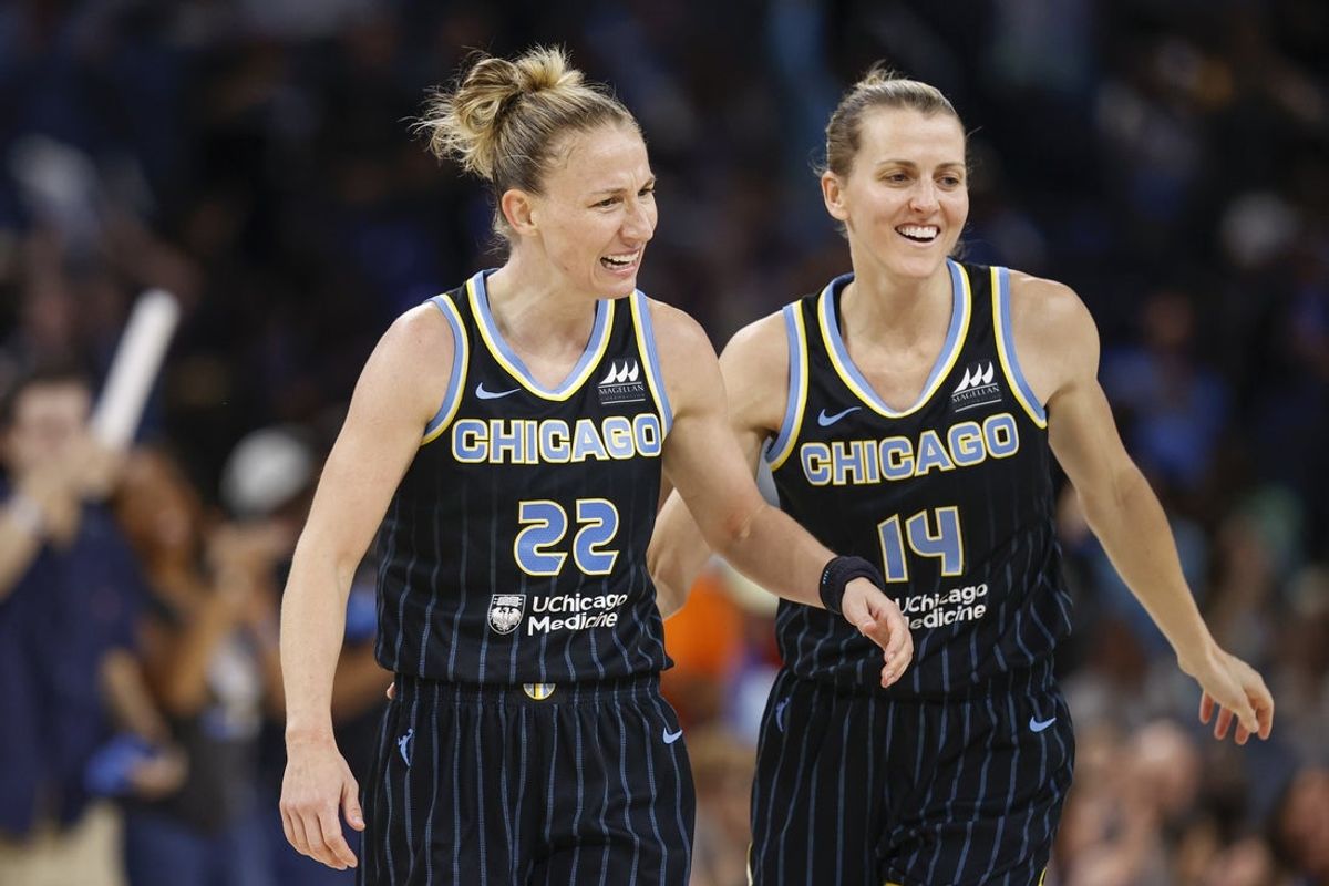 Aug 20, 2022; Chicago, Illinois, USA; Chicago Sky guard Courtney Vandersloot (22) celebrates with guard Allie Quigley (14) during the second half of Game 2 of the first round of the WNBA playoffs against the New York Liberty at Wintrust Arena. Mandatory Credit: Kamil Krzaczynski-Imagn Images
