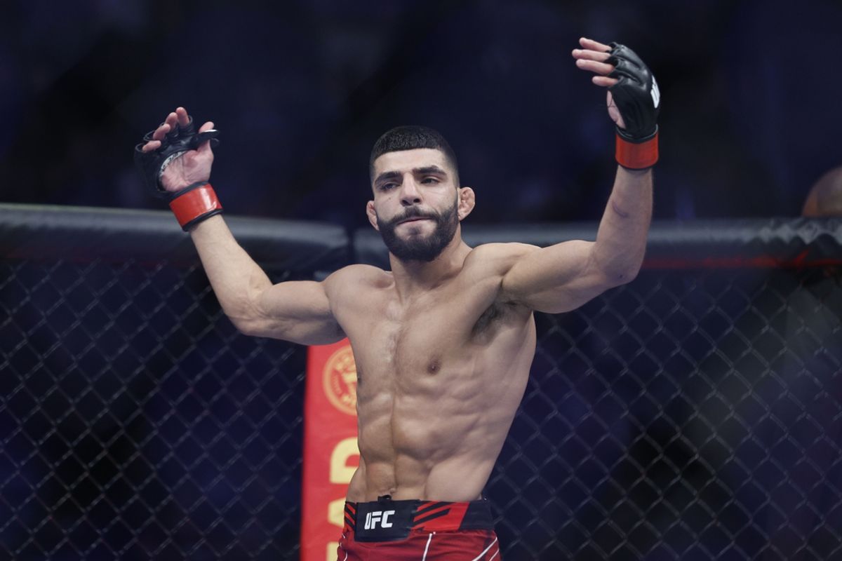 Aug 20, 2022; Salt Lake City, Utah, USA; Amir Albazi (red gloves) reacts after defeating Francisco Figueiredo (blue gloves) during UFC 278 at Vivint Arena. Mandatory Credit: Jeffrey Swinger-Imagn Images