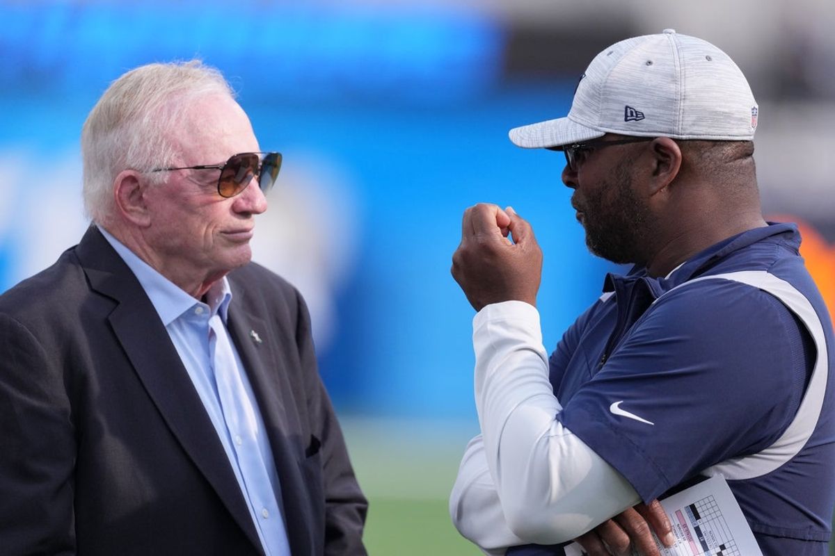 Aug 20, 2022; Inglewood, California, USA; Dallas Cowboys owner Jerry Jones (left) talks with vice president of player personnel Will McClay before the game against the Los Angeles Chargers at SoFi Stadium. Mandatory Credit: Kirby Lee-Imagn Images