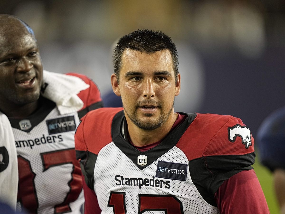 Aug 20, 2022; Toronto, Ontario, CAN; Calgary Stampeders quarterback Jake Maier (12) comes off the field after defeating the Toronto Argonauts at BMO Field. Mandatory Credit: John E. Sokolowski-Imagn Images