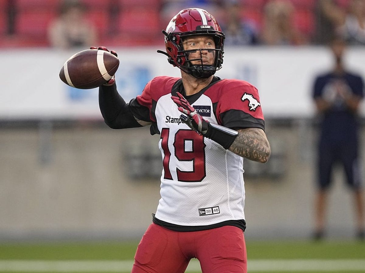Aug 20, 2022; Toronto, Ontario, CAN; Calgary Stampeders quarterback Bo Levi Mitchell (19) throws against the Toronto Argonauts at BMO Field. Mandatory Credit: John E. Sokolowski-USA TODAY Sports