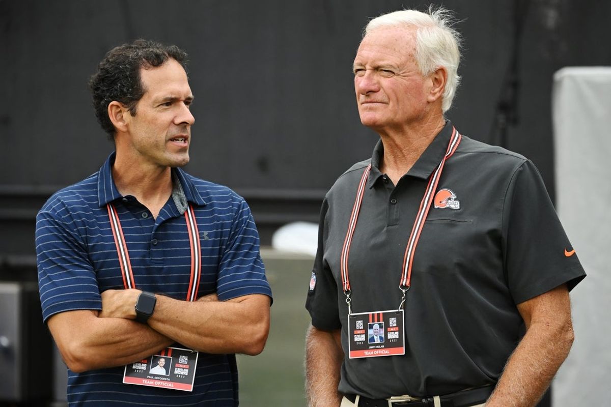 Aug 21, 2022; Cleveland, Ohio, USA; Cleveland Browns chief strategy officer Paul DePodesta, left, talks with managing and principal partner Jimmy Haslam before the game between the Cleveland Browns and the Philadelphia Eagles at FirstEnergy Stadium. Mandatory Credit: Ken Blaze-Imagn Images