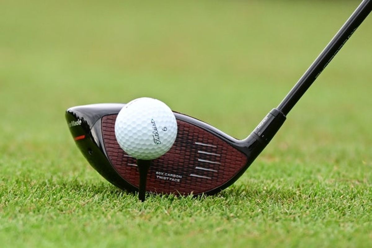 Aug 25, 2022; Atlanta, Georgia, USA; Close up view of the ball and club of Scott Scheffler during the first round of the TOUR Championship golf tournament. Mandatory Credit: Adam Hagy-Imagn Images