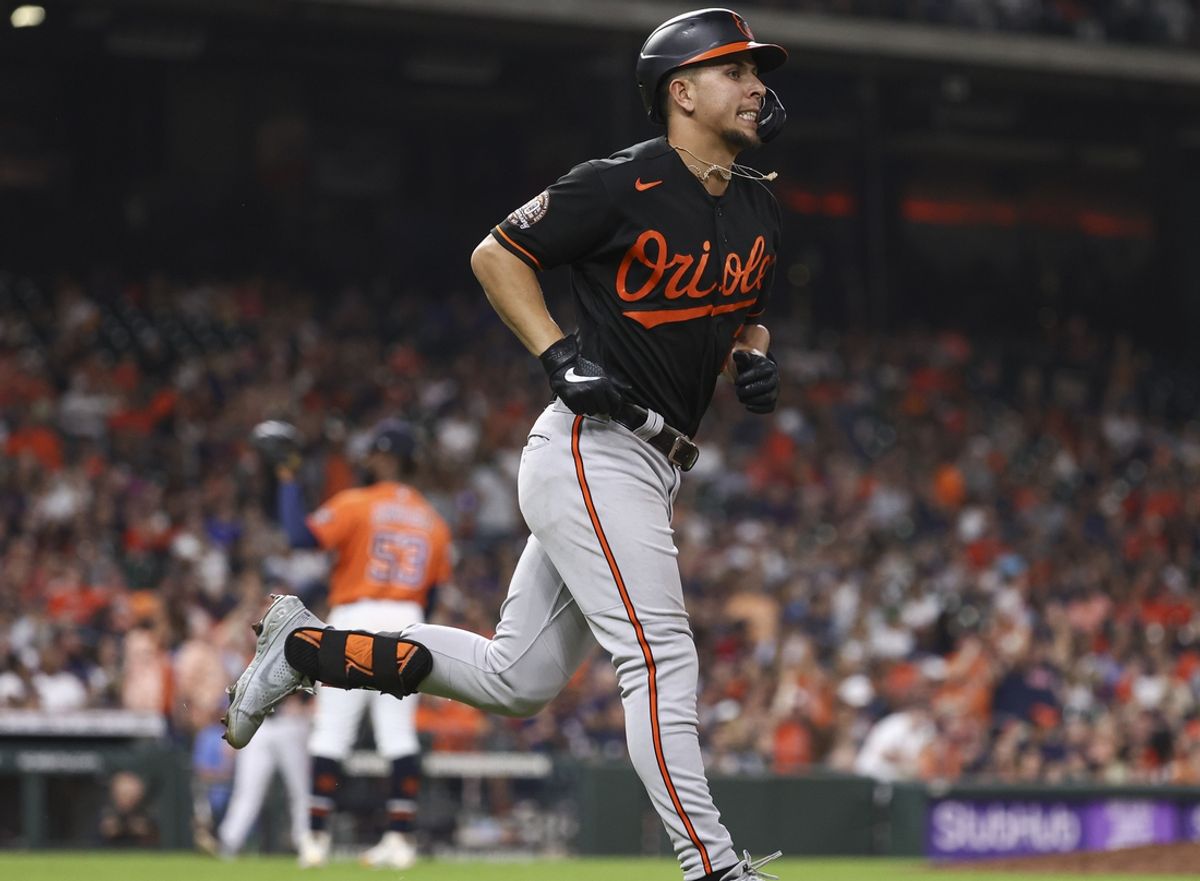 Aug 26, 2022; Houston, Texas, USA; Houston Astros starting pitcher Cristian Javier (53) reacts and Baltimore Orioles third baseman Ramon Urias (29) rounds the bases after hitting a home run during the sixth inning at Minute Maid Park. Mandatory Credit: Troy Taormina-USA TODAY Sports