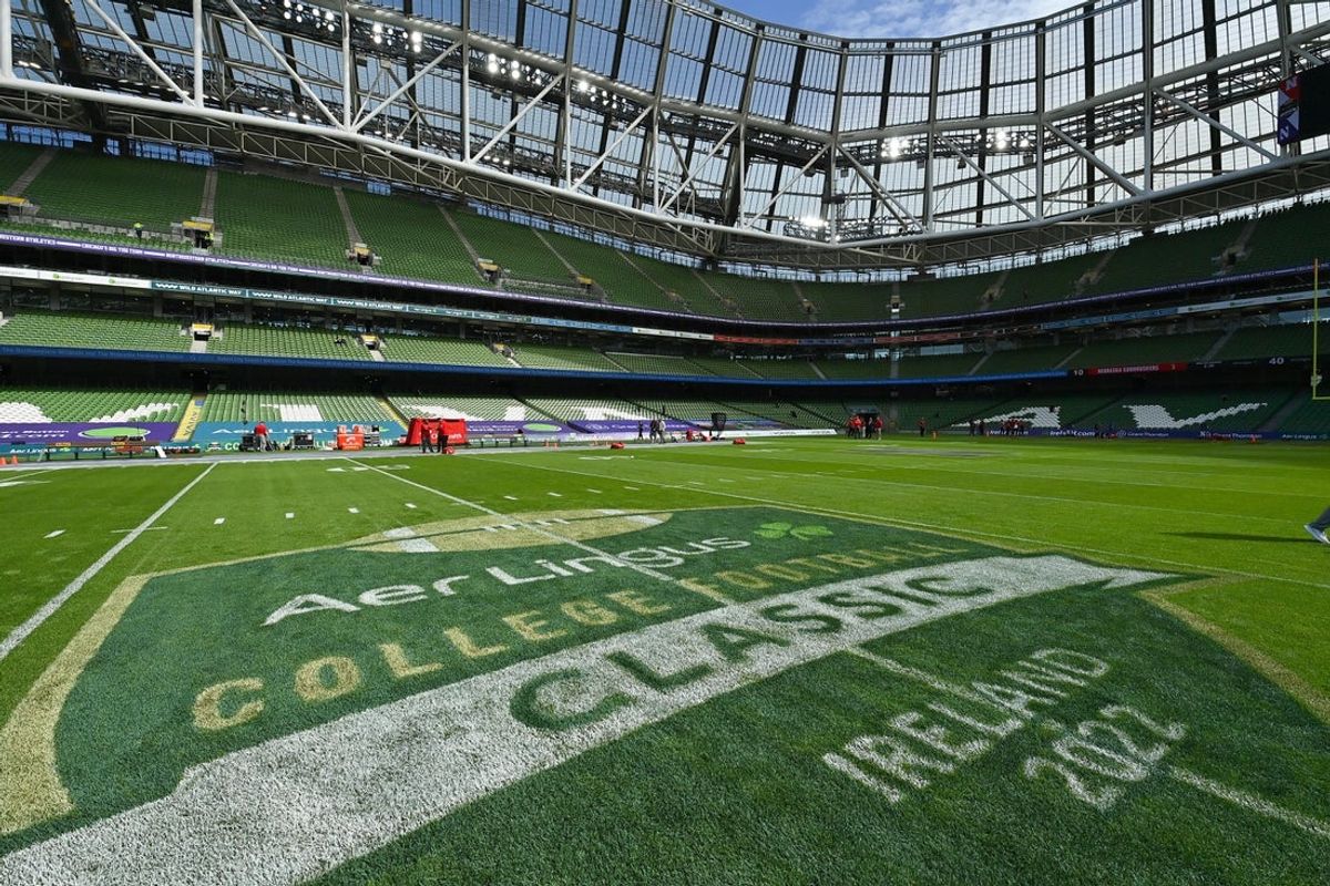 Aug 27, 2022; Dublin, IRELAND;  A general view of event branding on the pitch before the Aer Lingus college football series game between the Nebraska Cornhuskers and Northwestern Wildcats at Aviva Stadium. Mandatory Credit: Brendan Moran-Imagn Images