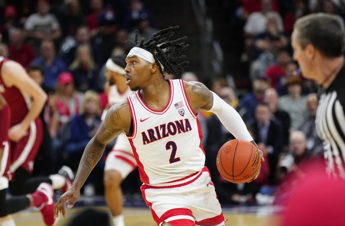 Arizona guard Caleb Love (2) dribbles up the court against Alabama during the Jerry Colangelo Hall of Fame Series at the Footprint Center on Dec. 20, 2023.