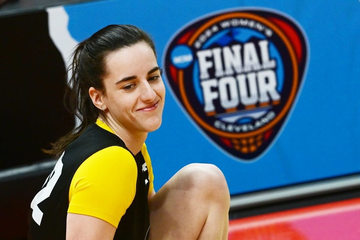 Apr 4, 2024; Cleveland, OH, USA; Iowa Hawkeyes guard Caitlin Clark (22) stretches during a practice session at Rocket Mortgage FieldHouse.